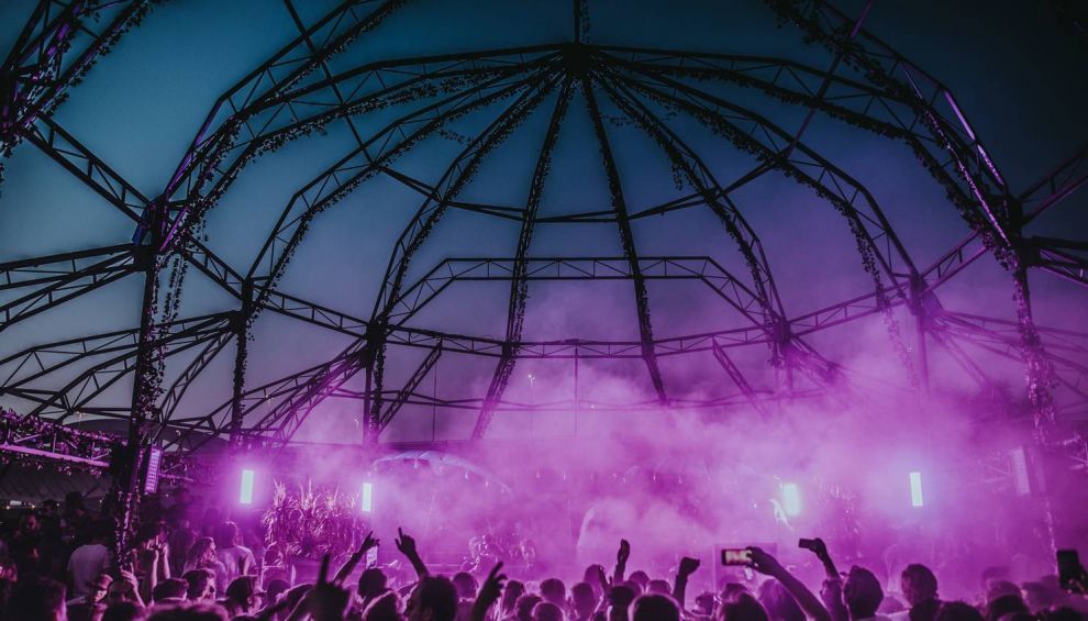 Crowd grooving under a giant disco ball at Strafwerk 2024